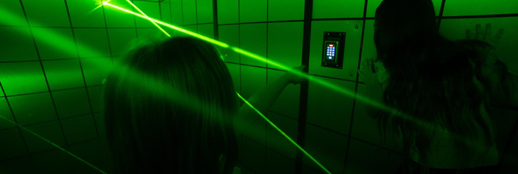 Close-up of a player working on an electronic panel in the Mastermind escape room at Fox in a Box Hong Kong.