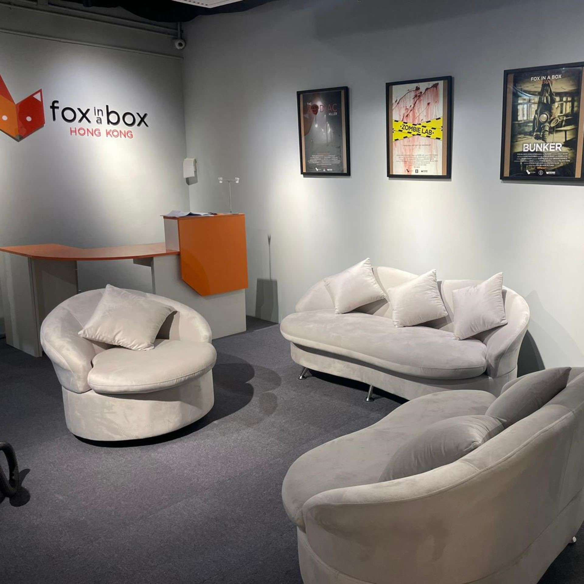 Interior view of the Fox in a Box Hong Kong lobby with modern design and welcoming atmosphere.